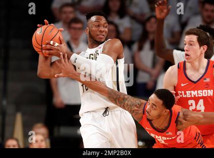 Georgia Tech guard Josh Okogie (5) celebrates with Jon Brown, right, late  in the second half of an NCAA college basketball game against the Miami  Wednesday, Jan. 3, 2018, in Atlanta. Georgia