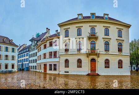 Modestly decorated buildings on Minster Cathedral square in Basel, Switzerland Stock Photo