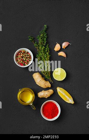 Composition with condiments on black background. All purpose spice, Stock Photo