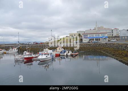 Iceland, Stykkishólmur on the Snaefellnes Peninsula:  boats moored in the harbour, with part of the town in the background. Stock Photo