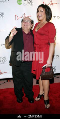 Actor Danny DeVito (L) and Food Network's '30 Minute Meals' host Rachael Ray arrive for the South Beach Wine & Food Festival's 'Fettuccine and Fiorentina' at Devito South Beach Restaurant. Miami Beach, FL. 2/23/08. Stock Photo