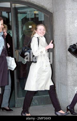 Surviving victim Kate Sheedy leaves court after the sentencing of murderous 39-year-old wheel clamper Levi Bellfield. Reports are that the families of the victims and Ms. Sheedy were happy with the sentence, crying 'Yes!' as the judge revealed his ruling, but condemned the killer as a coward for refusing to face them in court. Bellfield was sentenced to three life sentences for the murders of Amelie Delagrange, 22, and Marsha McDonnell, 19, and for leaving Kate Sheedy, then 18, for dead after running over her twice. London, UK. 2/26/08. Stock Photo