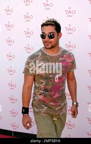 Celebrating the hottest pool party of 2008, Wilmer Valderrama poses for photographers before enjoying the many amenities that TAO Beach has to offer during the season kick-off at the Venetian. Las Vegas, NV. 4/12/08. Stock Photo