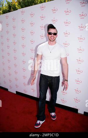 Celebrating the hottest pool party of 2008, Chris Evans poses for photographers before enjoying the many amenities that TAO Beach has to offer during the season kick-off at the Venetian. Las Vegas, NV. 4/12/08. Stock Photo