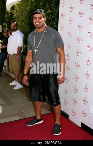 Celebrating the hottest pool party of 2008, Shawn Merriman poses for photographers before enjoying the many amenities that TAO Beach has to offer during the season kick-off at the Venetian. Las Vegas, NV. 4/12/08. Stock Photo