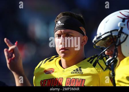 South Squad quarterback Kurt Benkert of Virginia, center, in action ...