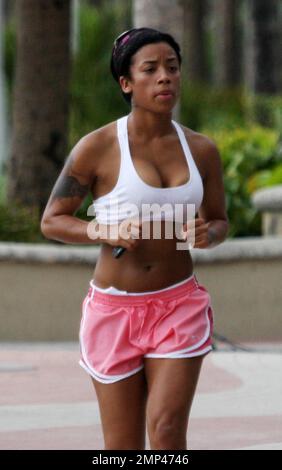 Exclusive!! R&B Singer songwriter Keyshia Cole goes jogging with a freind  on Miami Beach, FL, 7/1/08 Stock Photo - Alamy