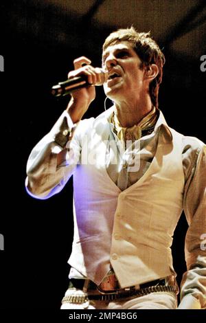 Perry Farrell rocks on stage with a bottle of wine and some special guests at the Red Rock Resort during the second Bottle Rock It event. In addition to the great live music, the event features a wine tasting charity auction with all proceeds benefiting the Las Vegas Springs Preserve. Las Vegas, NV.7/12/08. Stock Photo