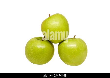 Image of three ripe green apples stacked in a pyramid Stock Photo