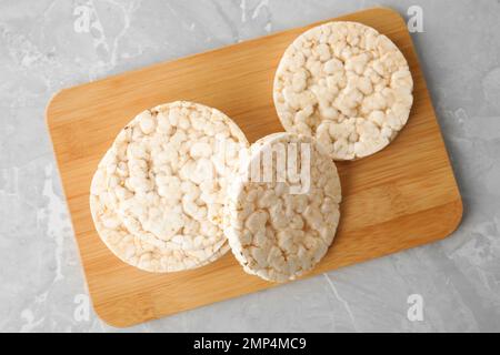 Crunchy rice cakes on grey marble table, top view Stock Photo