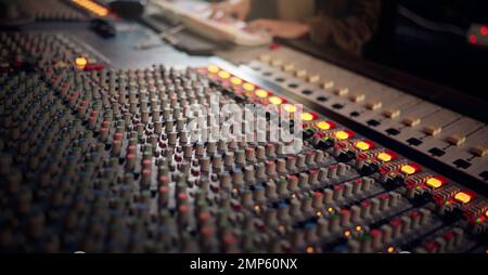 Background of sound mixer, control room and board in production studio of radio, broadcast or scales. Panel equipment, electronic music or audio Stock Photo