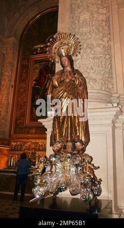 Gold robed statue of Mary immaculate conception by Alonso Martinez in the Cathedral of Saint Mary of the See Seville Andalusia Spain Stock Photo