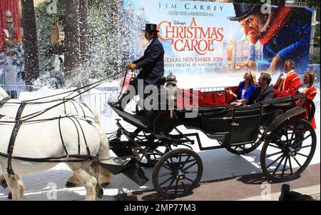 Colin Firth and Robin Wright Penn arrive in a horse-drawn carriage at the photocall for 'A Christmas Carol' at the Cannes Film Festival in Cannes, France. 5/18/09. Stock Photo