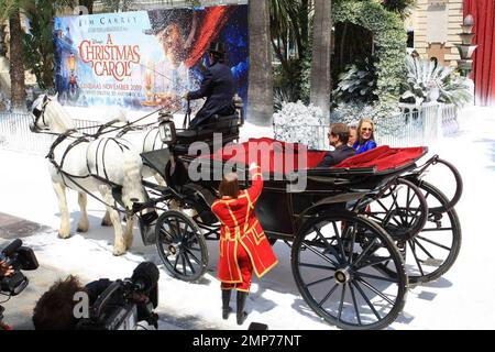 Colin Firth and Robin Wright Penn arrive in a horse-drawn carriage at the photocall for 'A Christmas Carol' at the Cannes Film Festival in Cannes, France. 5/18/09. Stock Photo