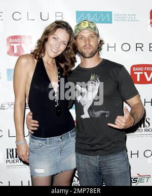 Jesse Spencer and girlfriend and fellow bandmate, Louise Griffiths, walk the red carpet at 'A Concert for Charity' at the Shore Club in Miami Beach, FL. 5/16/09. Stock Photo