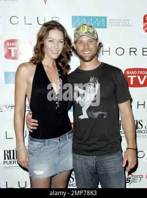 Jesse Spencer and girlfriend and fellow bandmate, Louise Griffiths, walk the red carpet at 'A Concert for Charity' at the Shore Club in Miami Beach, FL. 5/16/09. Stock Photo
