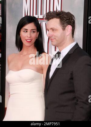 Sarah Silverman and Michael Sheen at the Los Angeles premiere of 'A Million Ways To Die In The West' held at the Regency Village Theatre in Los Angeles, CA. 15th May 2014. Stock Photo