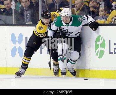 St. Louis Blues center Dakota Joshua (54) faces off against Dallas Stars  left wing Riley Tufte (27) during the second period of an NHL hockey game  on Friday, Dec. 17, 2021, in