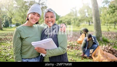 Volunteer hug, portrait and people cleaning garbage pollution, waste product or team environment support. Happy project leader, NGO community charity Stock Photo