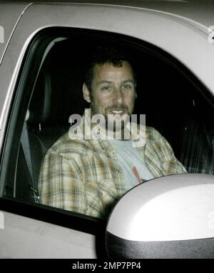 Exclusive!! Funny man actor Adam Sandler poses for photos outside