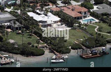 EXCLUSIVE!! Aerial views of actress Olivia Newton-John's $4.1 million, 7000-square-foot home that is currently under renovation.  The Jupiter Inlet Colony, Palm Beach waterfront home was bought by the 'Grease' star and her husband John Easterling in June 2009 one year after the couple wed.  The two-story house that has been described as having a Key West feel, has a wide floor plan, four bedrooms and is pet friendly.  Jupiter, FL. 04/27/10. Stock Photo