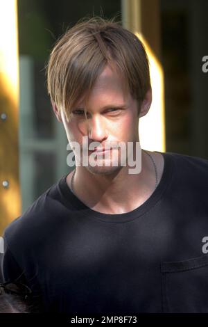 Swedish actor and star of 'True Blood,' Alexander Skarsgard films scenes on the set of his new movie 'What Maise Knew' in New York, NY. 12th August 2011. Stock Photo
