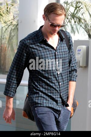 'True Blood' star Alexander Skarsgard looks focused and keeps his head down as he arrives at a local gym for a workout. Skarsgard, known for his portrayal of the vampire Eric Northman, is scheduled to appear in season four of the HBO series due to premiere June 12. Los Angeles, CA. 3/2/11.