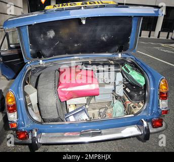 Alexandra Roach, who played the young Prime Minister in 'The Iron Lady' poses with the bomb-proof car used by Margaret Thatcher during her term. London, UK. 2nd May 2012. . Stock Photo