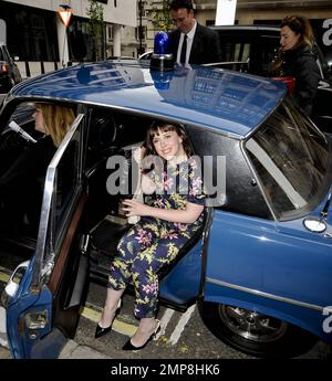 Alexandra Roach, who played the young Prime Minister in 'The Iron Lady' poses with the bomb-proof car used by Margaret Thatcher during her term. London, UK. 2nd May 2012. . Stock Photo