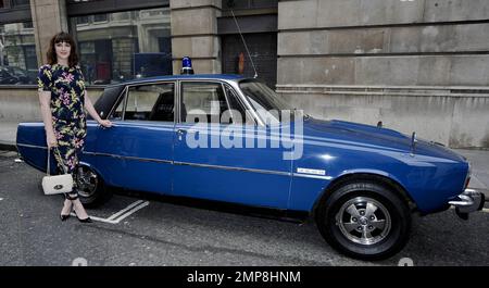 Alexandra Roach, who played the young Prime Minister in 'The Iron Lady' poses with the bomb-proof car used by Margaret Thatcher during her term. London, UK. 2nd May 2012. . Stock Photo