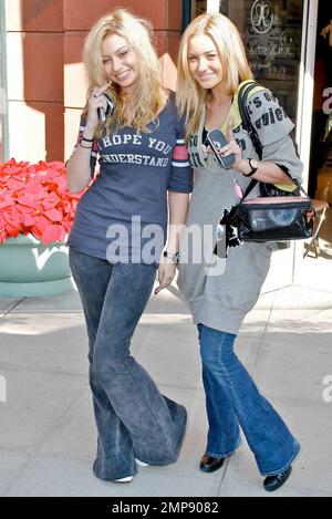 Disney's teen pop sister act, Aly and AJ, also known as  Alyson Renae 'Aly' and Amanda Joy 'AJ' Michalka enjoy some shopping in Beverly Hills, CA. 12/5/07. Stock Photo