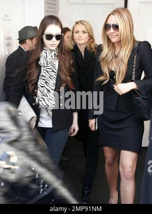 Amanda Bynes and Michelle Trachtenberg leave the Pamela Roland fashion show at Mercedes-Benz Fashion Week. New York, NY 2/17/09 Stock Photo