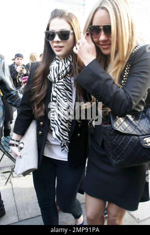 Amanda Bynes and Michelle Trachtenberg leave the Pamela Roland fashion show at Mercedes-Benz Fashion Week. New York, NY 2/17/09 Stock Photo