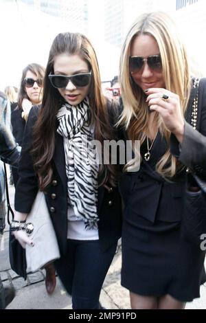 Amanda Bynes and Michelle Trachtenberg leave the Pamela Roland fashion show at Mercedes-Benz Fashion Week. New York, NY 2/17/09 Stock Photo