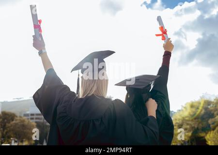 Back, education and black woman with graduation, celebration and success  with a diploma. Female person, graduate and girl with a degree, achievement  Stock Photo - Alamy