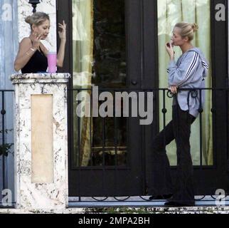 EXCLUSIVE!! Despite recent rumors of pregnancy, Anna Kournikova was spotted  on the balcony of her