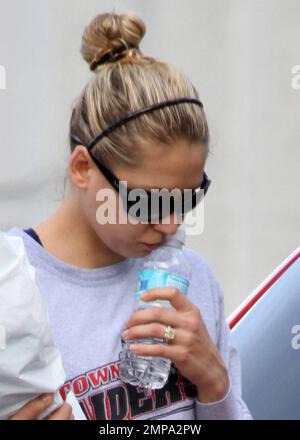 EXCLUSIVE!! Russian celebrity tennis pro Anna Kournikova hides her face as  she leaves the gym after a workout session. Anna, who according to reports  has earned in the past $11 million from