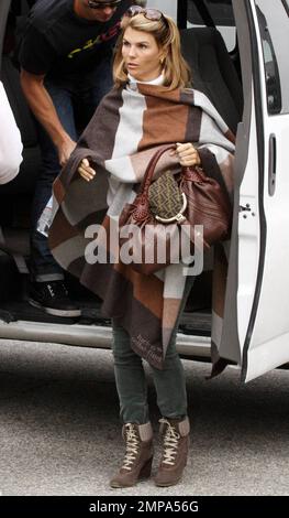 Lori Loughlin is all smiles as she arrives on the set of the teen drama ...