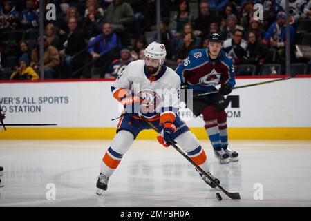 New York Islanders defenseman Nick Leddy (2) pulls the jersey of  Philadelphia Flyers center Kevin Hayes (13) in the first period of an NHL  hockey game Saturday, March 20, 2021, in Uniondale