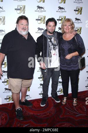 Jackass' star Bam Margera with patents Phil Margera and April Margera celebrate his birthday at Studio 54 inside the MGM Grand Resort & Casino. Las Vegas, NV. 1st October 2011.   . Stock Photo