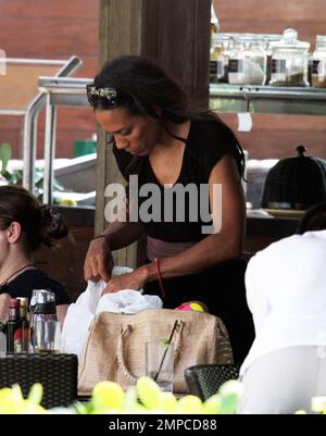 Boris Becker's ex-wife Barbara Feltus takes her son Elias and his pals for lunch. Barbara got a cuddle and a kiss from her young son. Miami, FL. 6/10/10. Stock Photo