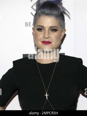 Kelly Osbourne poses at the 4th Annual BeautyCon at LA Mart in Los Angeles, August 16. 2014. Stock Photo