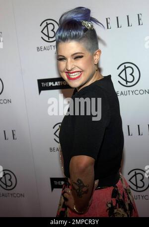 Kelly Osbourne poses at the 4th Annual BeautyCon at LA Mart in Los Angeles, August 16. 2014. Stock Photo
