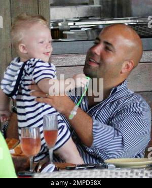 Former number one professional tennis player Boris Becker and his wife  Sharlely 'Lilly' Kerssenberg Becker enjoy a relaxing lunch at their luxury  hotel with friends and their baby son Amadeus Benedict Edley