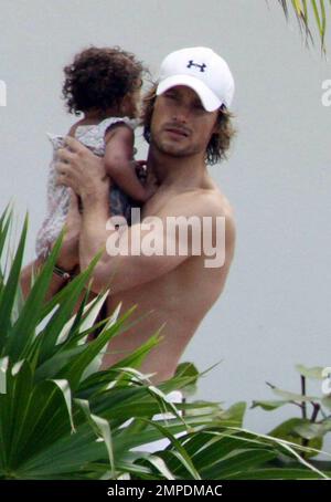 Halle Berry, Gabriel Aubry and their young daughter Nahla spend the afternoon at the pool. Miami, Fl. 7/7/09.     . Stock Photo