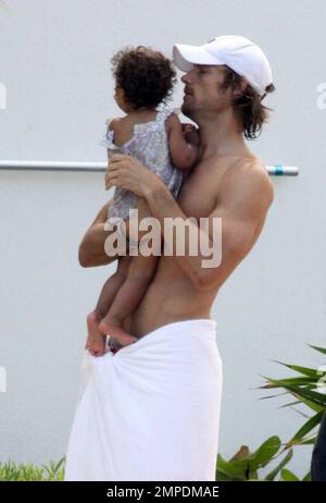 Halle Berry, Gabriel Aubry and their young daughter Nahla spend the afternoon at the pool. Miami, Fl. 7/7/09.     . Stock Photo