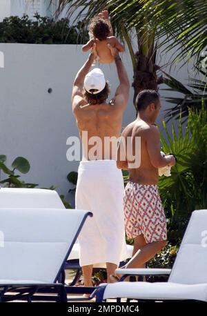 Halle Berry, Gabriel Aubry and their young daughter Nahla spend the afternoon at the pool. Miami, Fl. 7/7/09. Stock Photo