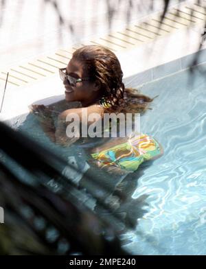 Exclusive!! Beyonce and friends lounge poolside at their luxury Miami ...