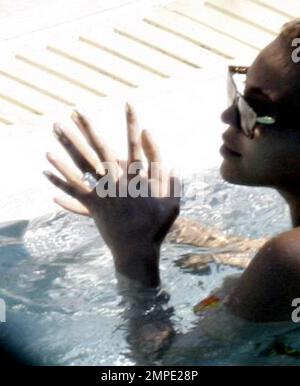 Exclusive!! Diamonds are a girl's best friend...even in the pool ...