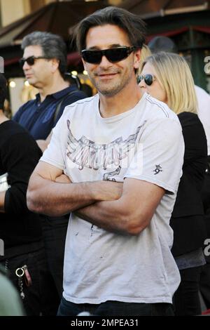 Billy Baldwin comes to the Grove to cheer his wife Chynna Phillips who performed with her pop group Wilson Phillips. Los Angeles, CA. 11/09/10. Stock Photo